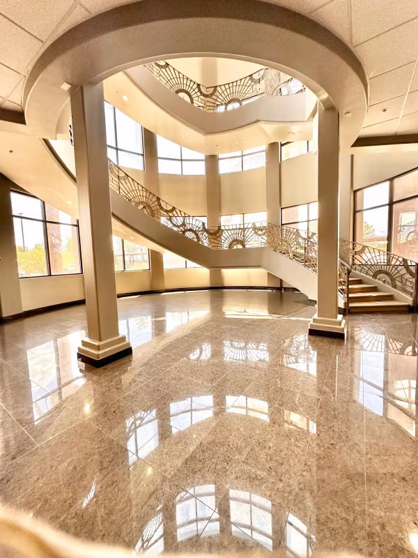 Marble foyer with columns and the staircase above